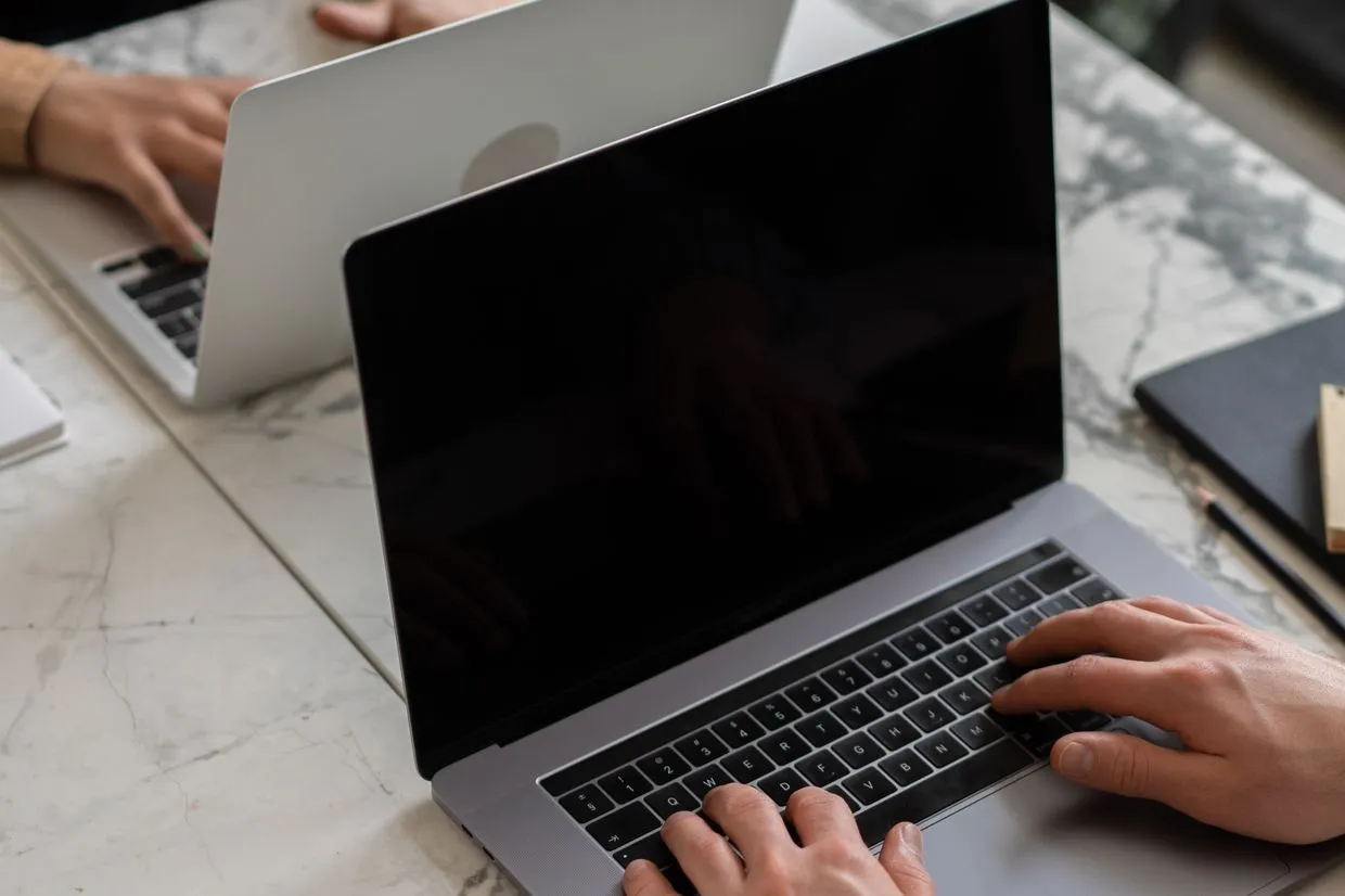 Content Writing — Writers drafting website content on laptops