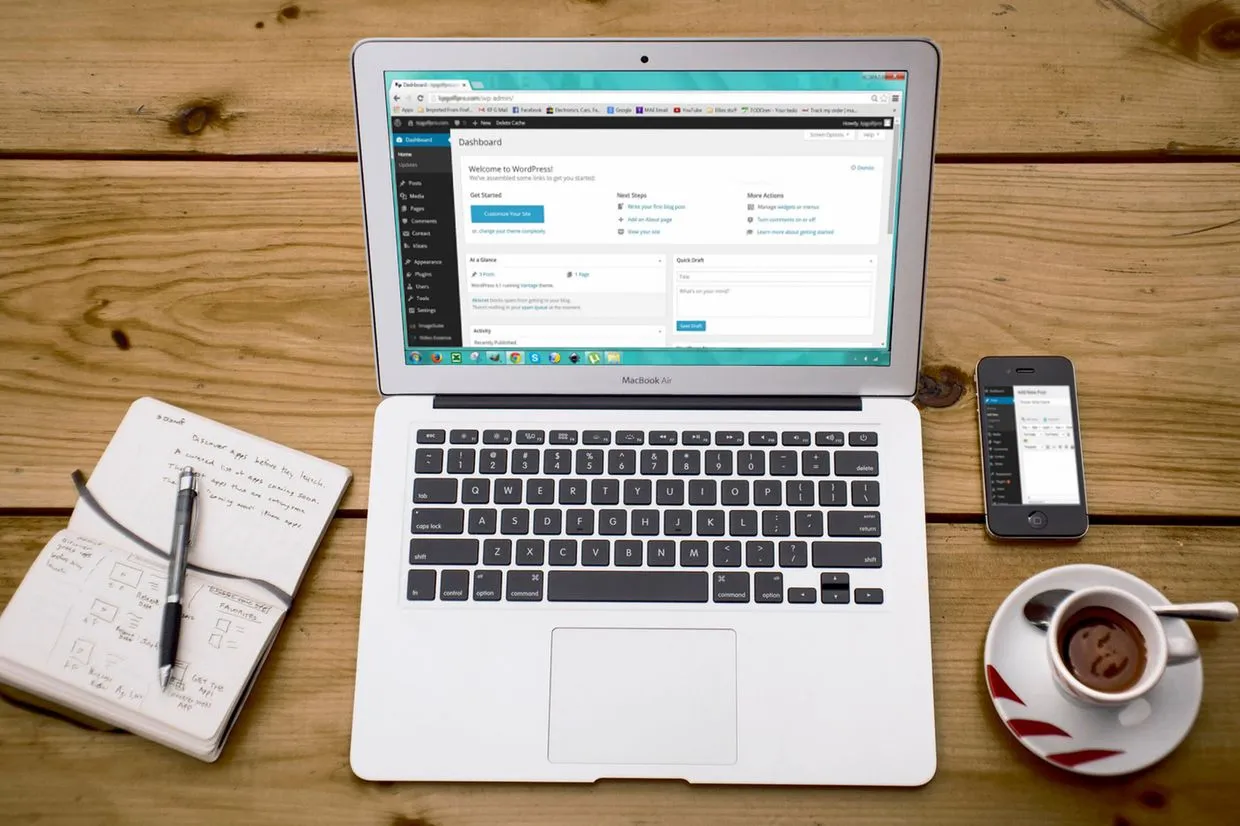WordPress Development — The WordPress admin dashboard open on a laptop